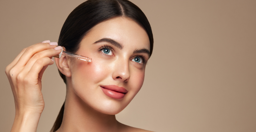 Woman massaging cleansing oil onto her face