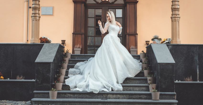 Rack of understated wedding dresses in a bridal boutique