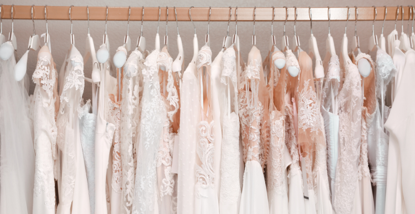 Bride wearing a minimalist white satin wedding gown
