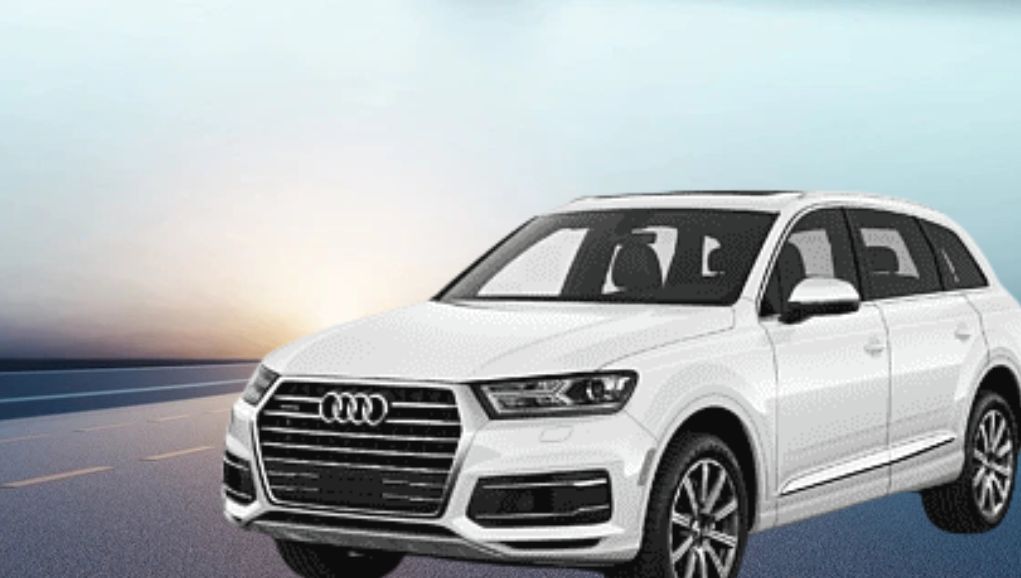 Luxury crossover driving along a coastal road