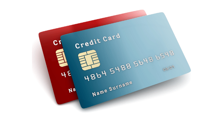 Prepaid debit card held in front of a store display